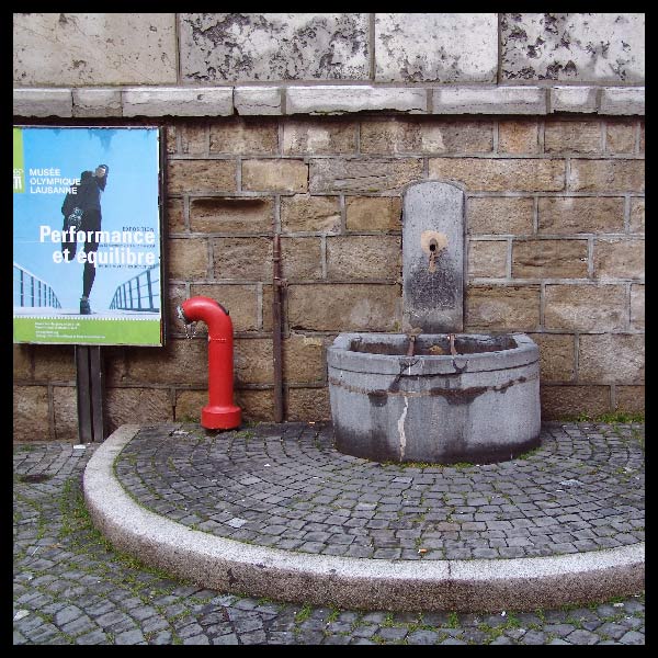 Lozanna - afisz, hydrant, fontanna (2004)