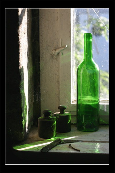 window, bottle and knife