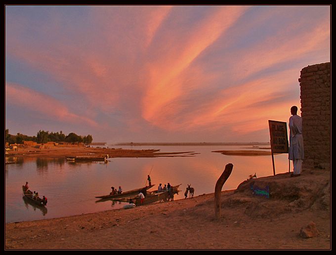 sunset over river niger