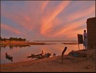 sunset over river niger