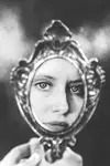 In the mirror. 