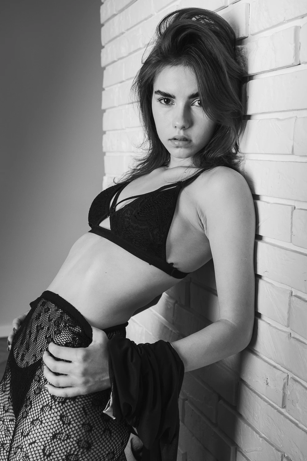 T.